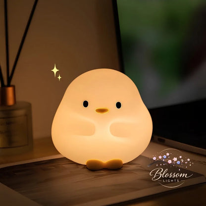Ducky Glow patito de luz cálida sobre el escritorio